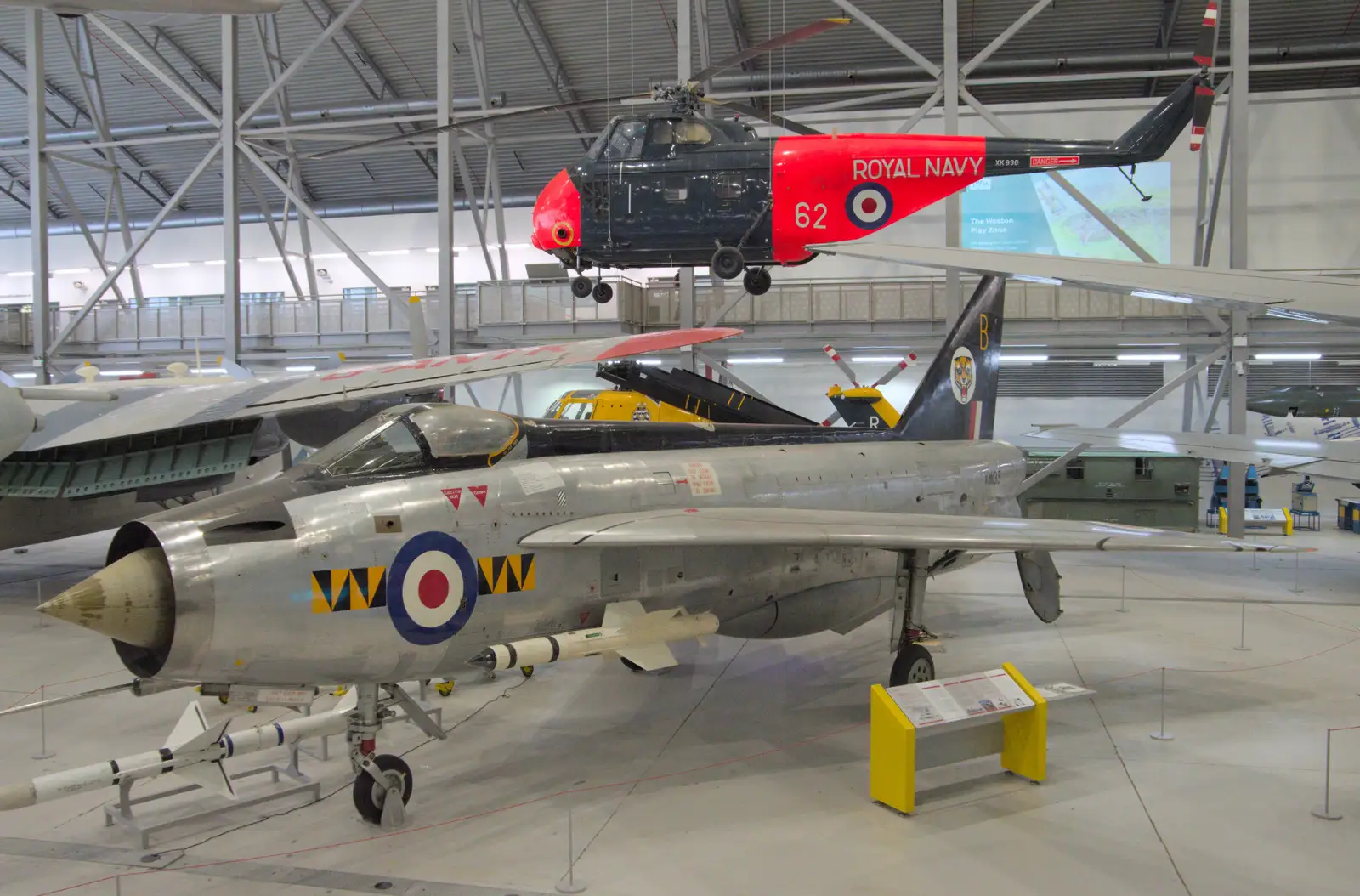 A helicopter and an English Electric Lightning, from Flying in a Dragon Rapide, IWM Duxford, Cambridgeshire - 17th August 2024