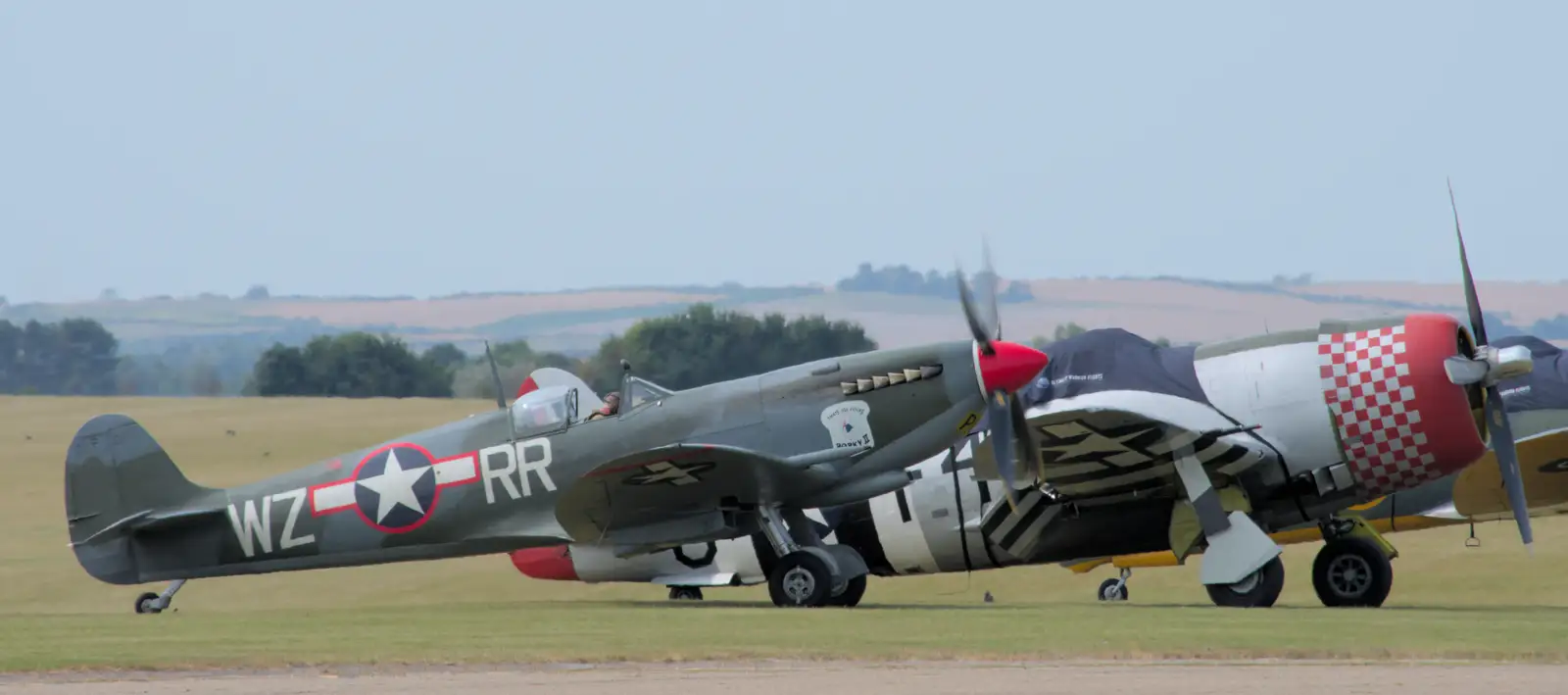 Another Spitfire in USAAF markings, from Flying in a Dragon Rapide, IWM Duxford, Cambridgeshire - 17th August 2024