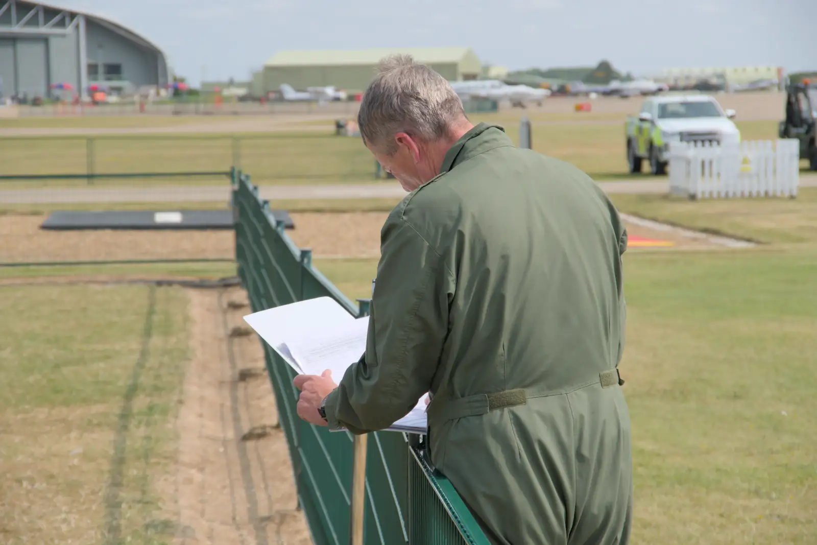 The Spitfire pilot updates his logbook, from Flying in a Dragon Rapide, IWM Duxford, Cambridgeshire - 17th August 2024