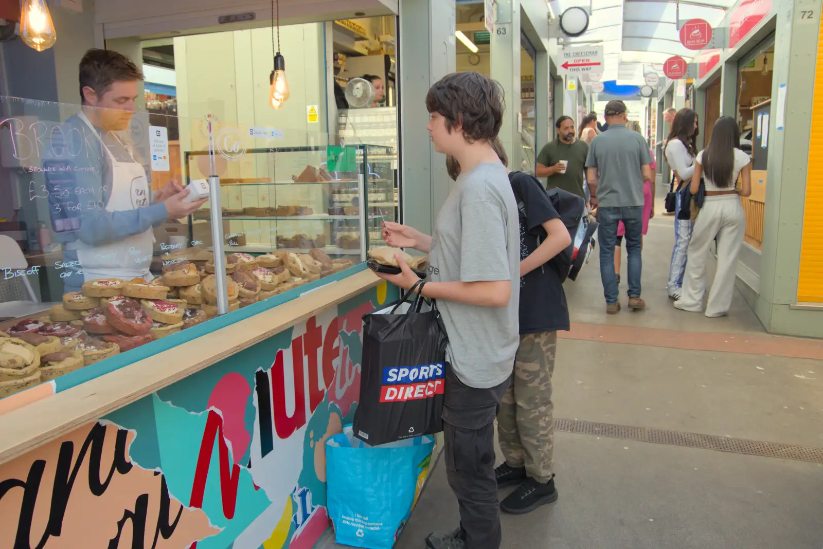 Fred and Harry get massive cookies from the market, from The Death of the Feather Factory, Diss, Norfolk - 30th August 2024