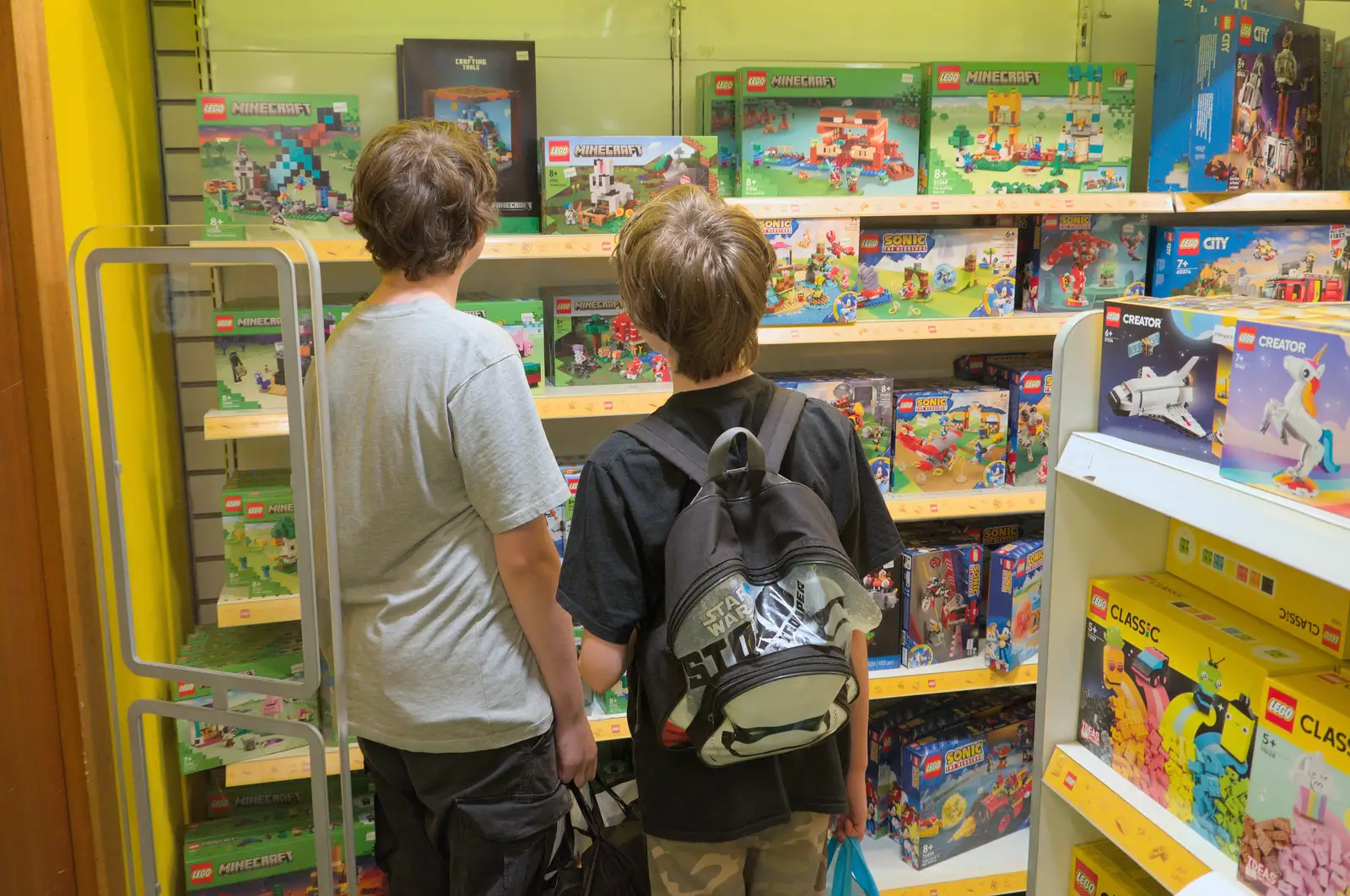 The boys look at Lego Minecraft in Jarrold's, from The Death of the Feather Factory, Diss, Norfolk - 30th August 2024