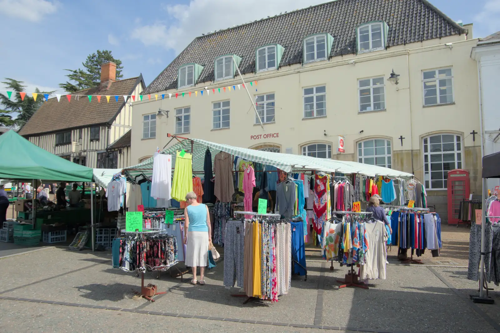 A clothes stall in front of the old Post Office, from The Death of the Feather Factory, Diss, Norfolk - 30th August 2024