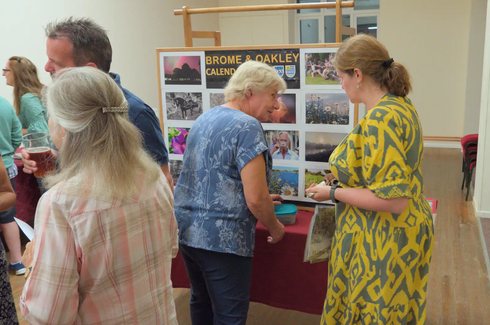 Jane and Isobel chat by the calendar display, from The Death of the Feather Factory, Diss, Norfolk - 30th August 2024