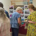 Jane and Isobel chat by the calendar display, The Death of the Feather Factory, Diss, Norfolk - 30th August 2024