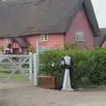 A headless woman outside the old Swan Pub , A Protest on the Beach, Aldeburgh, Suffolk - 1st September 2024