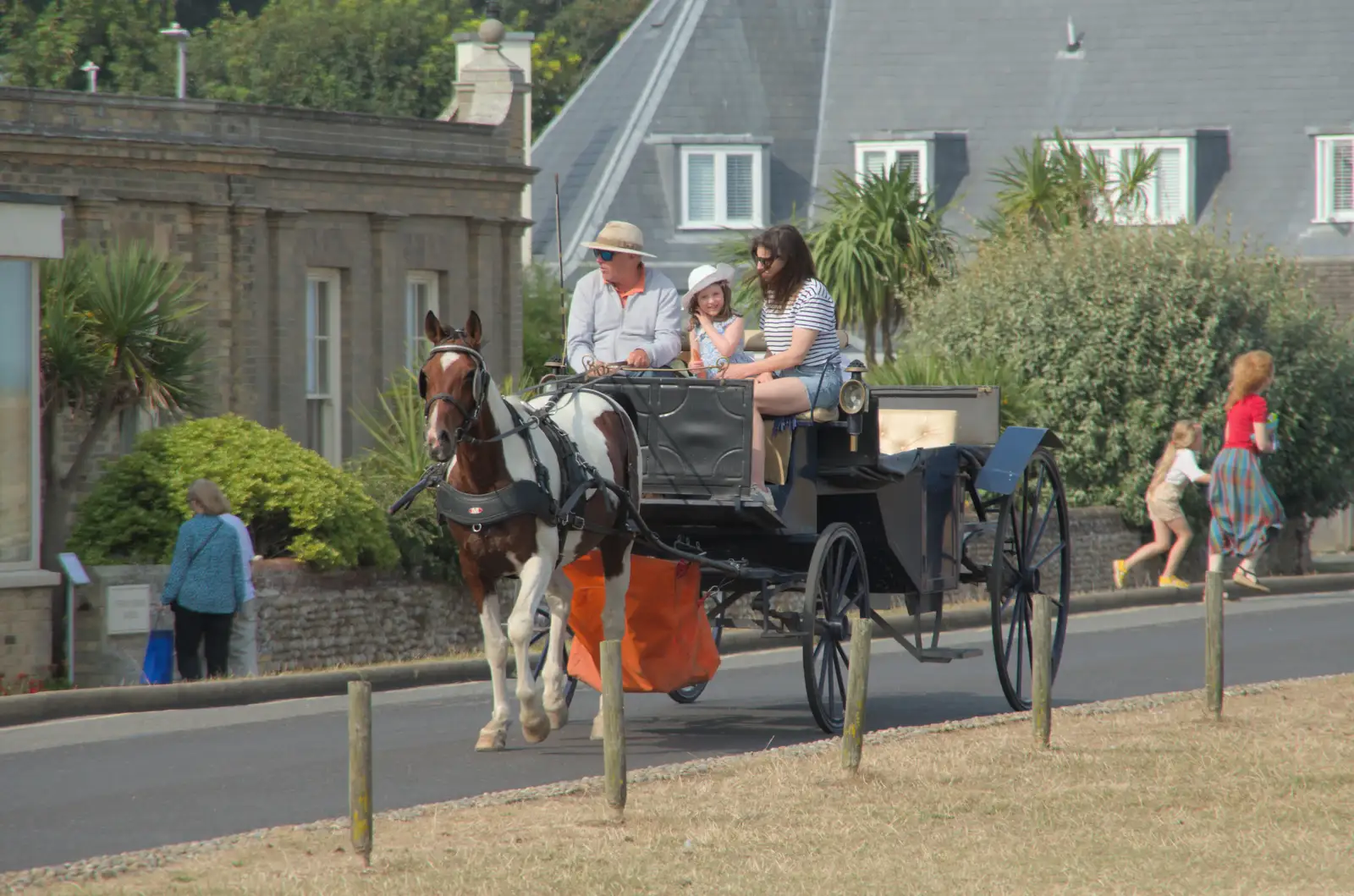 A horse and carriage clatters along Thorpe Road, from A Protest on the Beach, Aldeburgh, Suffolk - 1st September 2024