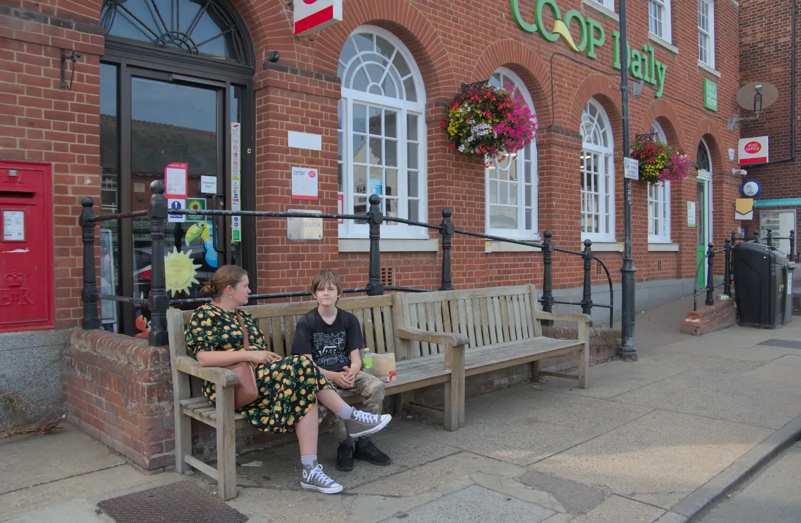 Isobel and Harry hang around outside the Co-op, from A Protest on the Beach, Aldeburgh, Suffolk - 1st September 2024