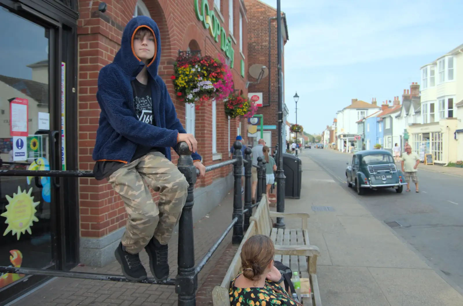 Harry sits on the fence outside the Co-op, from A Protest on the Beach, Aldeburgh, Suffolk - 1st September 2024