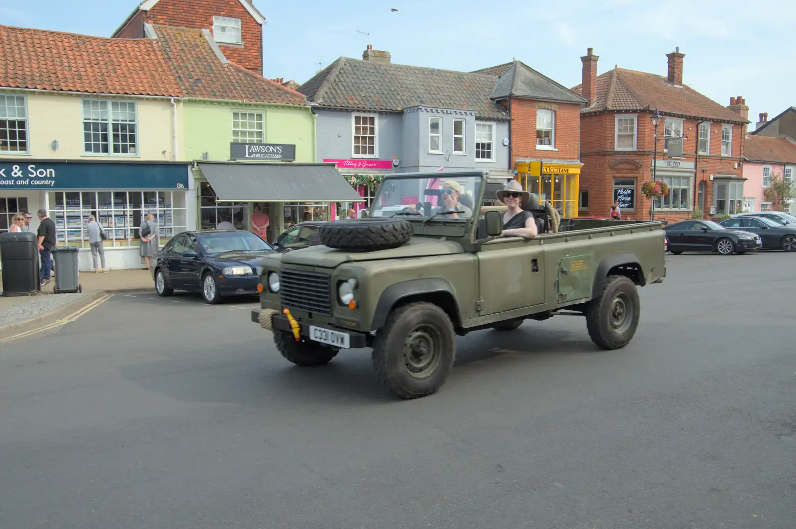 A classic Land Rover heads up the road, from A Protest on the Beach, Aldeburgh, Suffolk - 1st September 2024