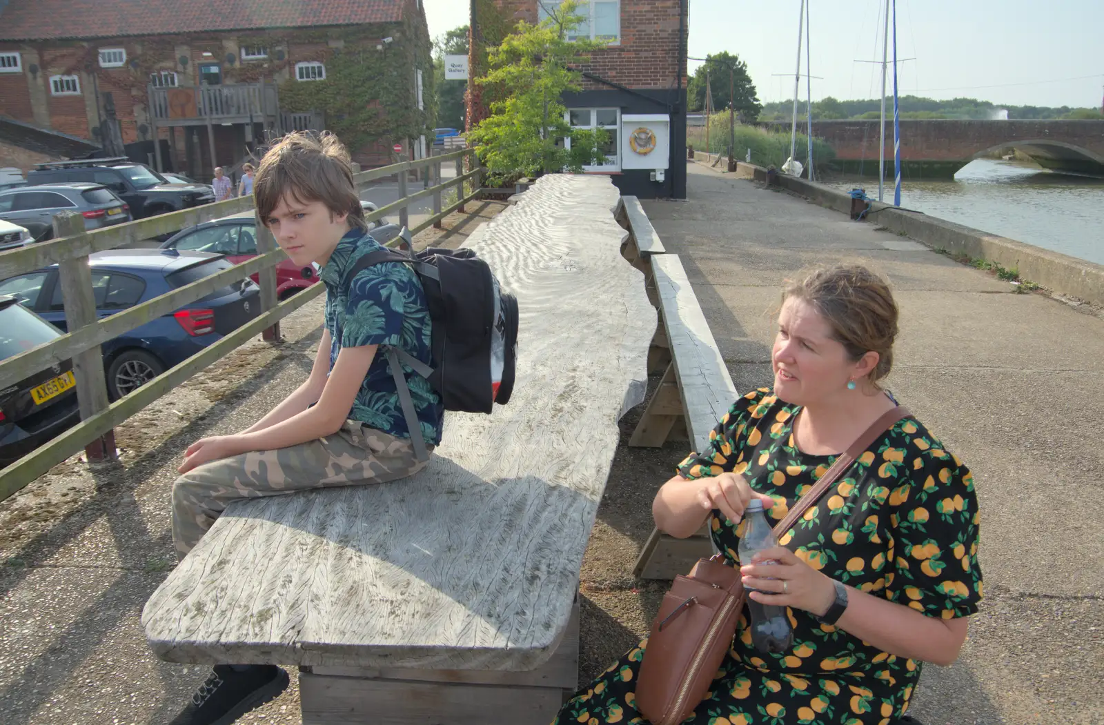 Harry sits on a giant single-plank table, from A Protest on the Beach, Aldeburgh, Suffolk - 1st September 2024