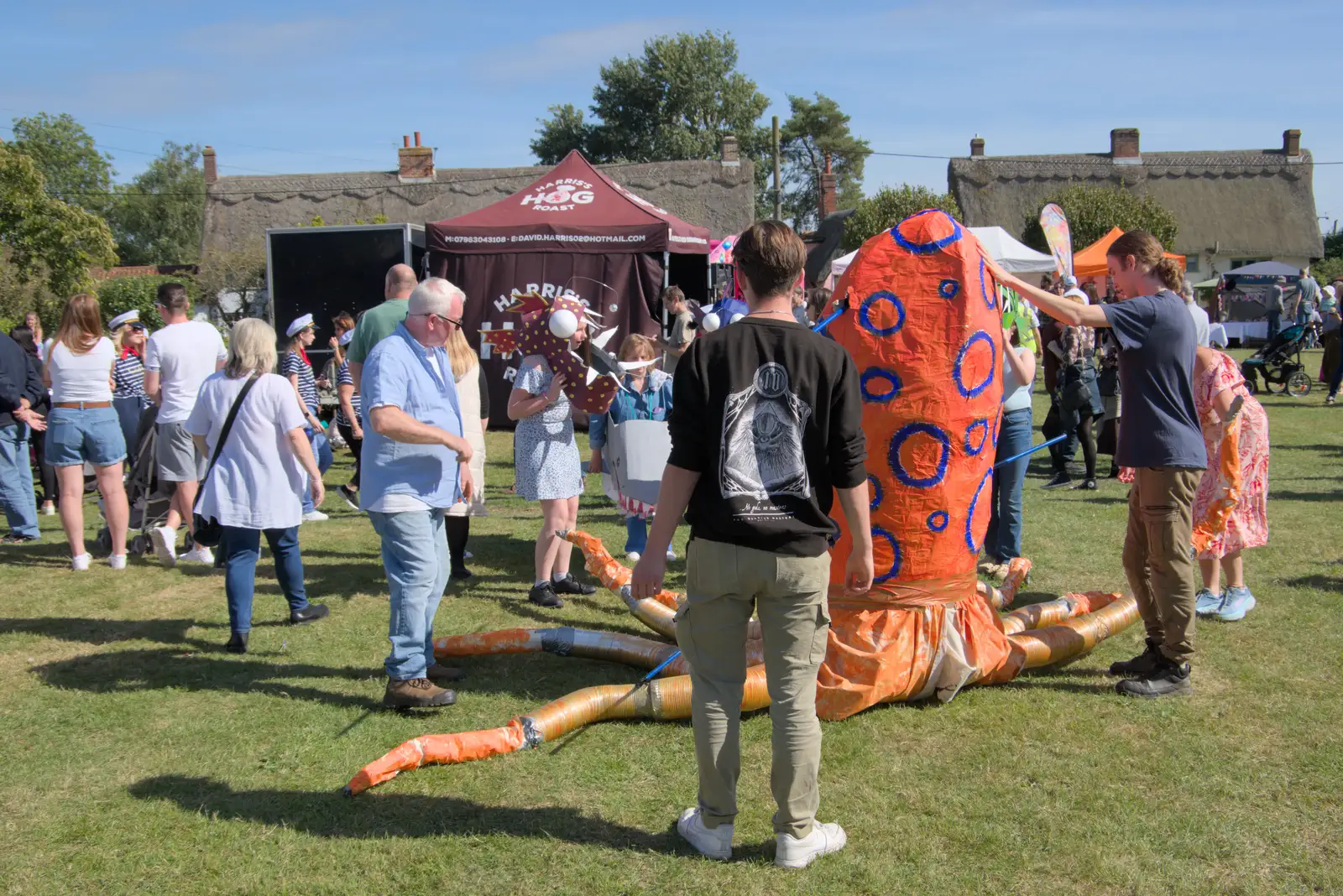 A giant octopus is hauled around, from Palgrave Players Busking and the GSB at Pulham Market, Norfolk - 14th September 2024