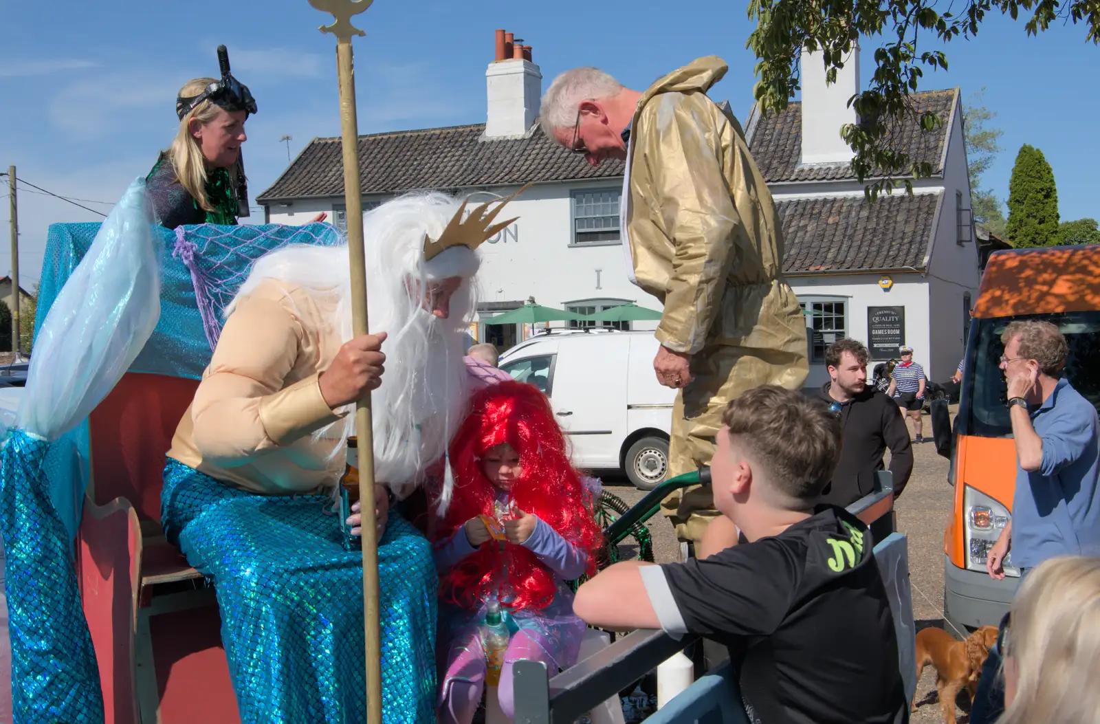 Neptune chats to a bystander, from Palgrave Players Busking and the GSB at Pulham Market, Norfolk - 14th September 2024