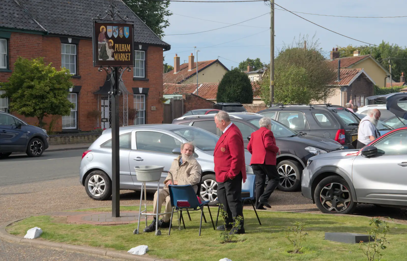 Ron - former flugel player - watches the band, from Palgrave Players Busking and the GSB at Pulham Market, Norfolk - 14th September 2024