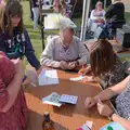 Isobel helps sort out the raffle, Palgrave Players Busking and the GSB at Pulham Market, Norfolk - 14th September 2024