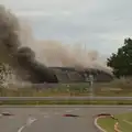 Smoke piles out of the Highways Nissen hut, A Major Fire at Suffolk Highways, Brome, Suffolk - 15th September 2024