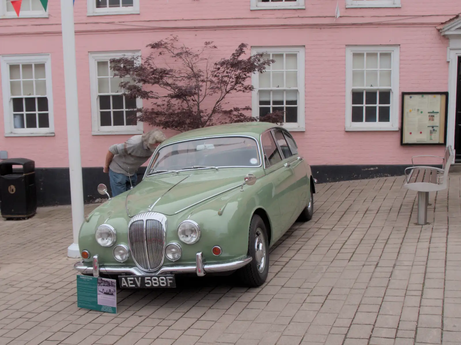 There's a green Daimler outside the town hall, from Diss Heritage Transport Festival and the GSB at Wickham Skeith - 22nd September 2024