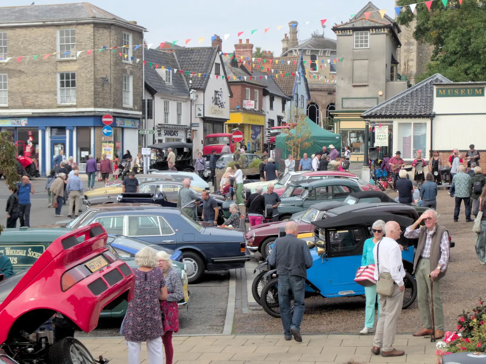 Classic cars in the market place, from Diss Heritage Transport Festival and the GSB at Wickham Skeith - 22nd September 2024