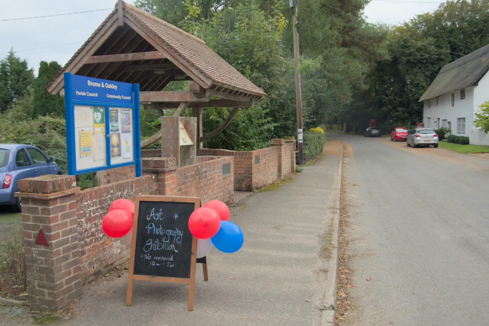 Balloons and a sign outside the village hall, from Sunflowers, A Quiz at Westhorpe and a GSB Duck Race, Eye - 29th September 2024