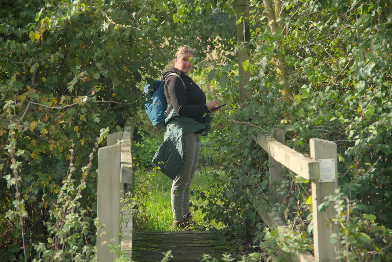 Isobel pauses beyond another small bridge, from A Walk to the Railway Tavern, Mellis, Suffolk - 13th October 2024