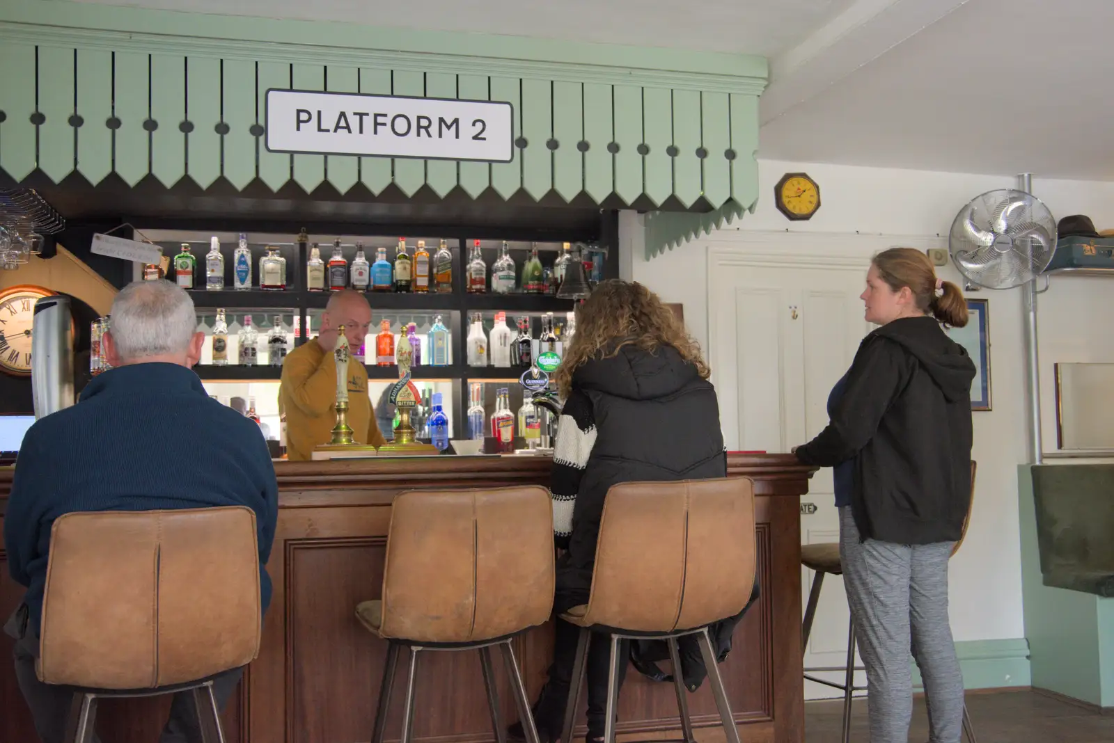 Isobel gets the beers in , from A Walk to the Railway Tavern, Mellis, Suffolk - 13th October 2024