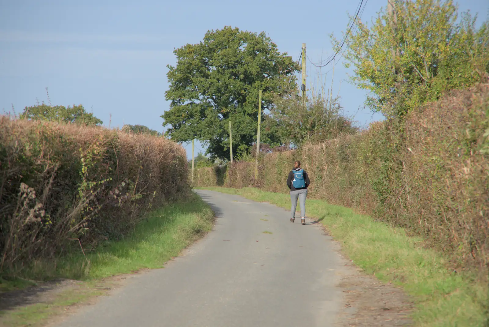 Isobel on the road back to Thrandeston, from A Walk to the Railway Tavern, Mellis, Suffolk - 13th October 2024