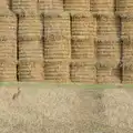 A hare pauses in front of a stack of bales, A Walk to the Railway Tavern, Mellis, Suffolk - 13th October 2024