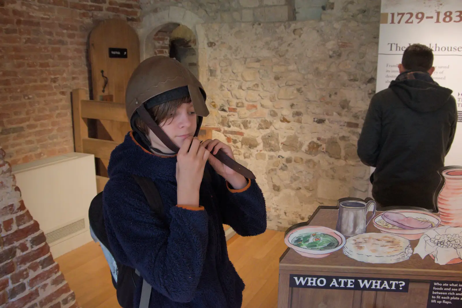 Harry tries on a helmet, from The Witchfinder General at Framlingham Castle, Suffolk - 26th October 2024