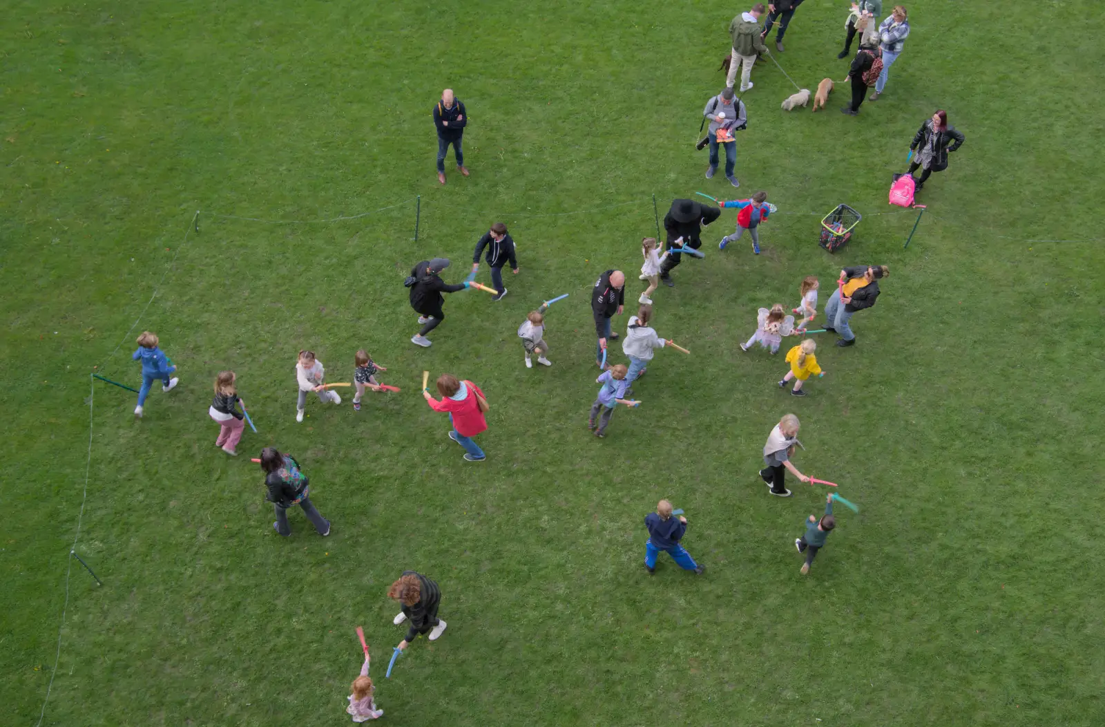 There's a mock swordfight between kids and adults, from The Witchfinder General at Framlingham Castle, Suffolk - 26th October 2024