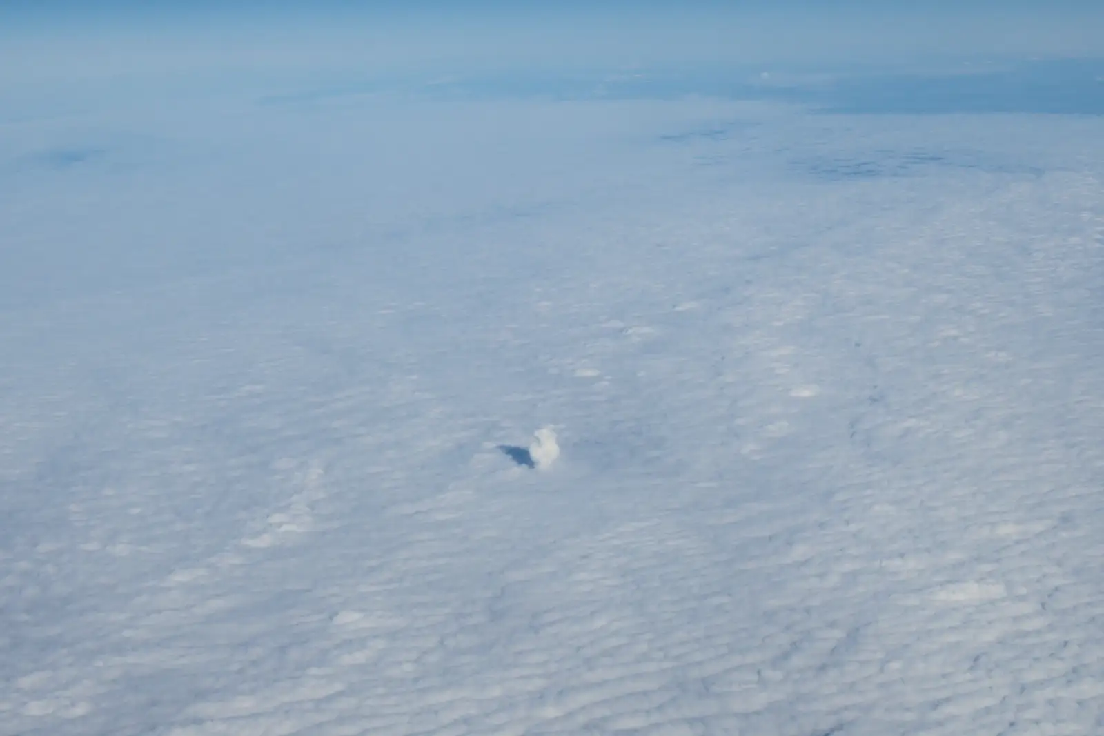 A solitary cloud balloons up from the cloud deck, from A Trip to Lloret de Mar, Catalonia, Spain - 27th October 2024