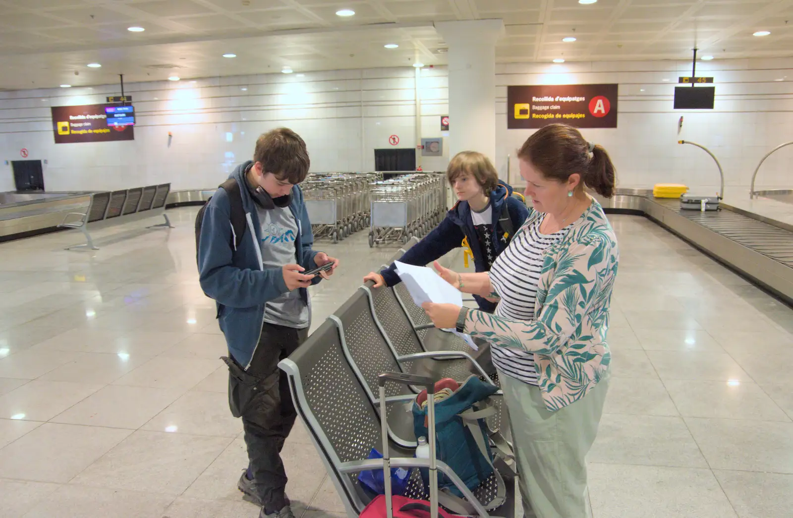 We check the instructions for the car hire, from A Trip to Lloret de Mar, Catalonia, Spain - 27th October 2024