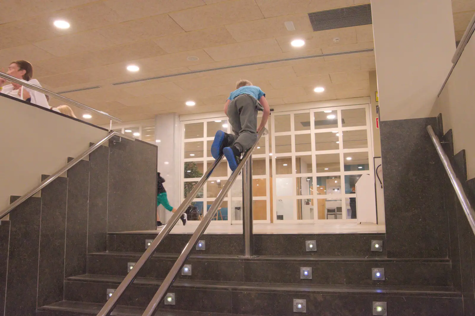 Some kids are sliding down the handrail, from A Trip to Lloret de Mar, Catalonia, Spain - 27th October 2024