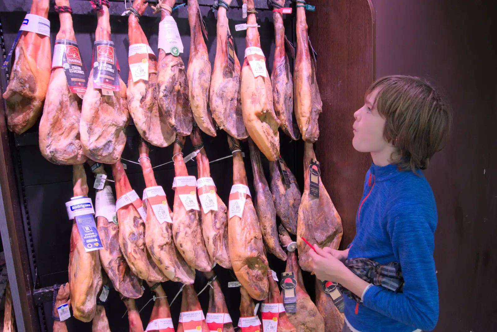 Harry looks at legs of Jamón Iberico, from A Trip to Lloret de Mar, Catalonia, Spain - 27th October 2024