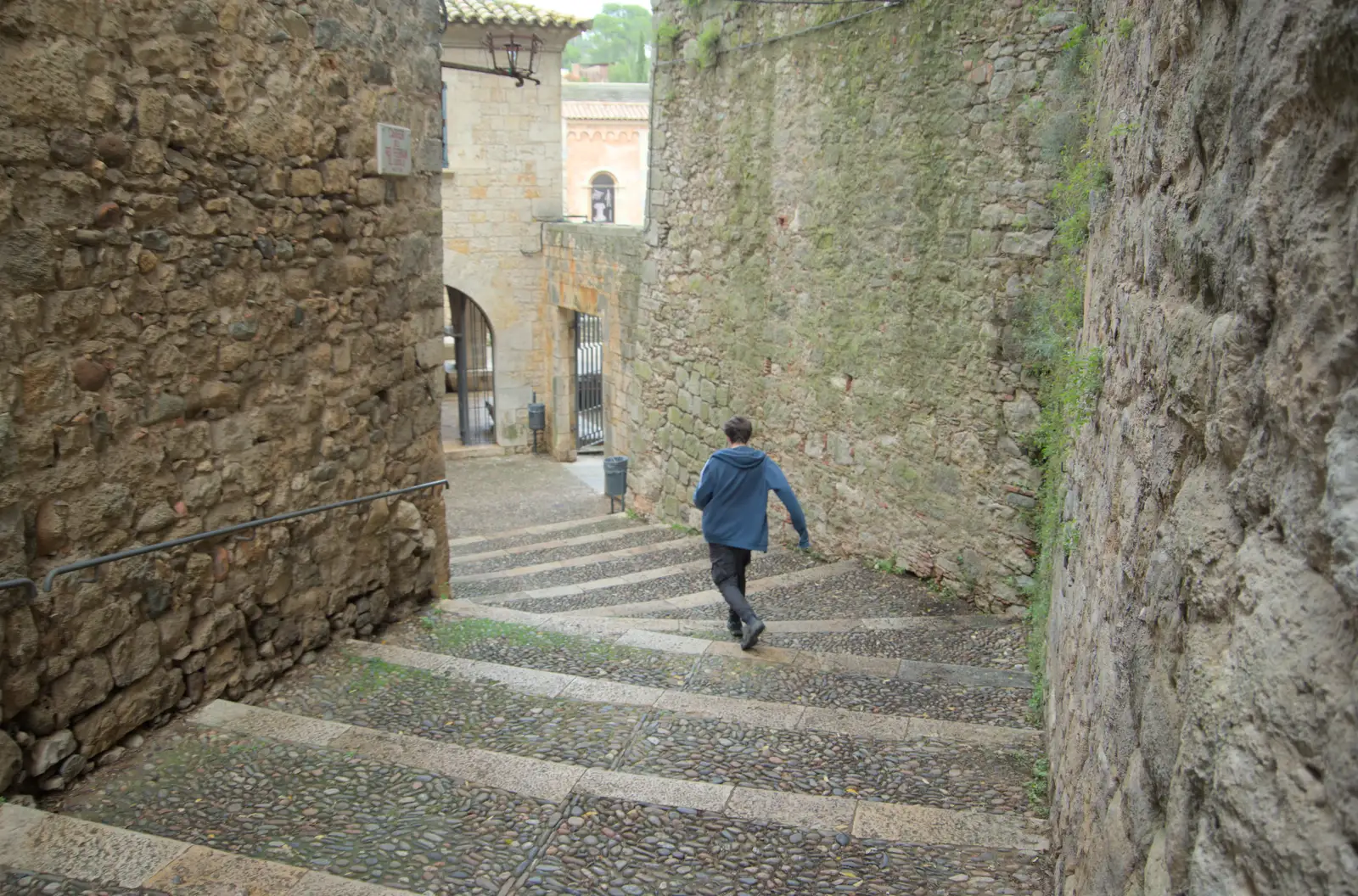 Fred legs it down some stone steps, from A Return to Girona, Catalunya, Spain - 29th October 2024