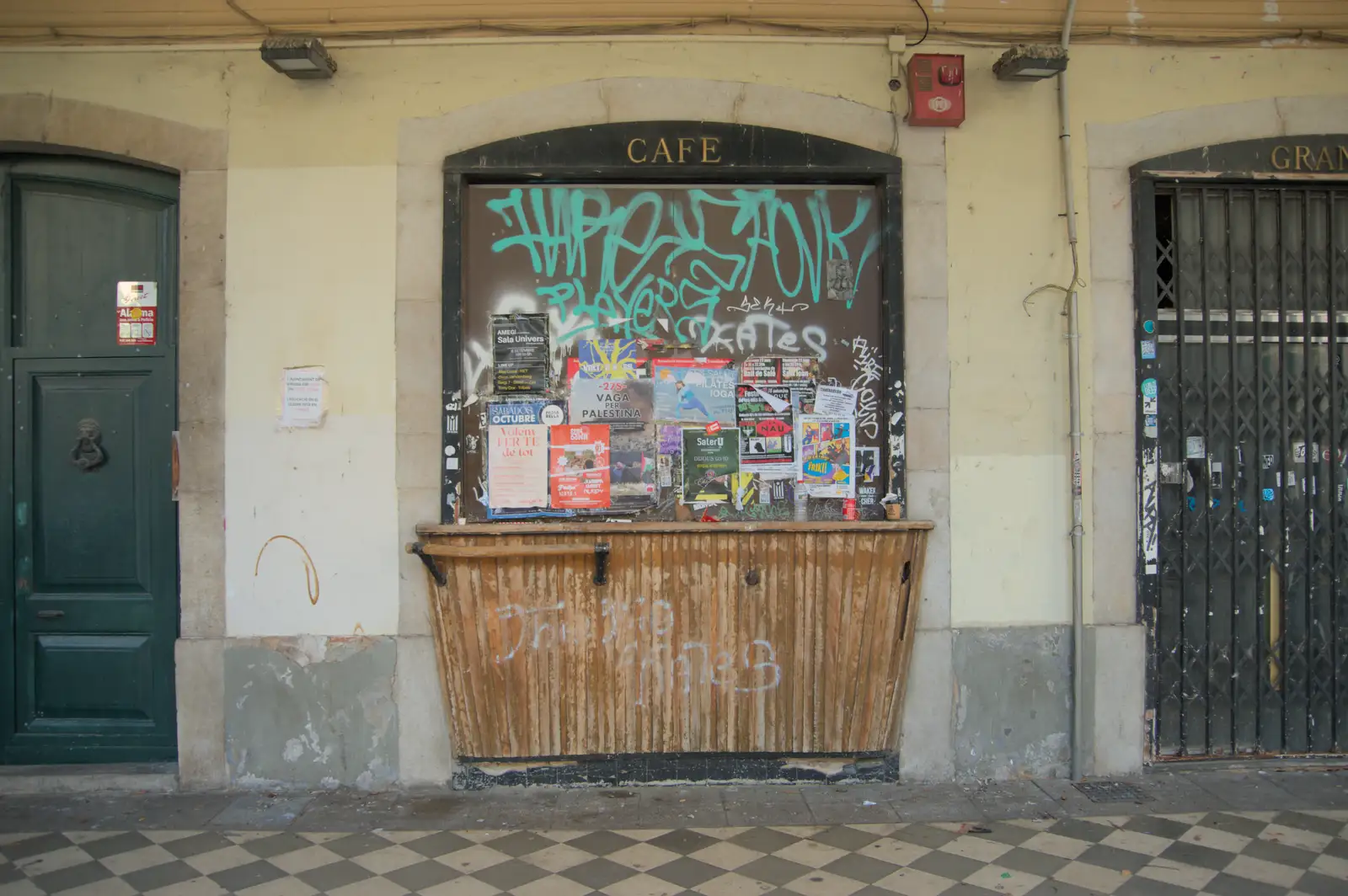 A tiny café is covered in posters and graffiti, from A Return to Girona, Catalunya, Spain - 29th October 2024