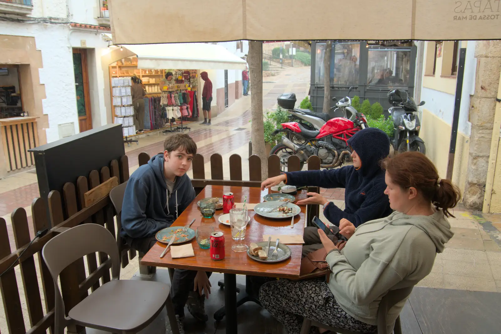 We hide out from a heavy rain shower, from A Postcard From Tossa de Mar, Catalunya, Spain - 30th October 2024