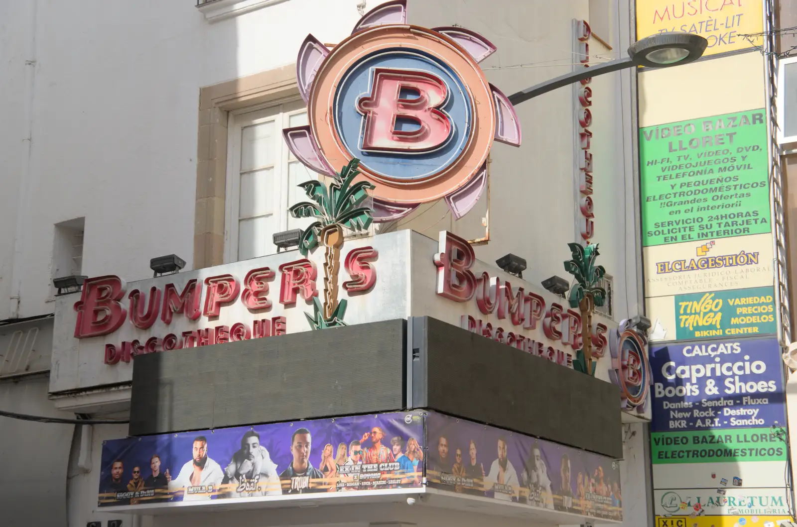 There's some great antique neon in a square, from Halloween and Flamenco Guitar, Lloret de Mar, Catalunya, Spain - 31st October 2024