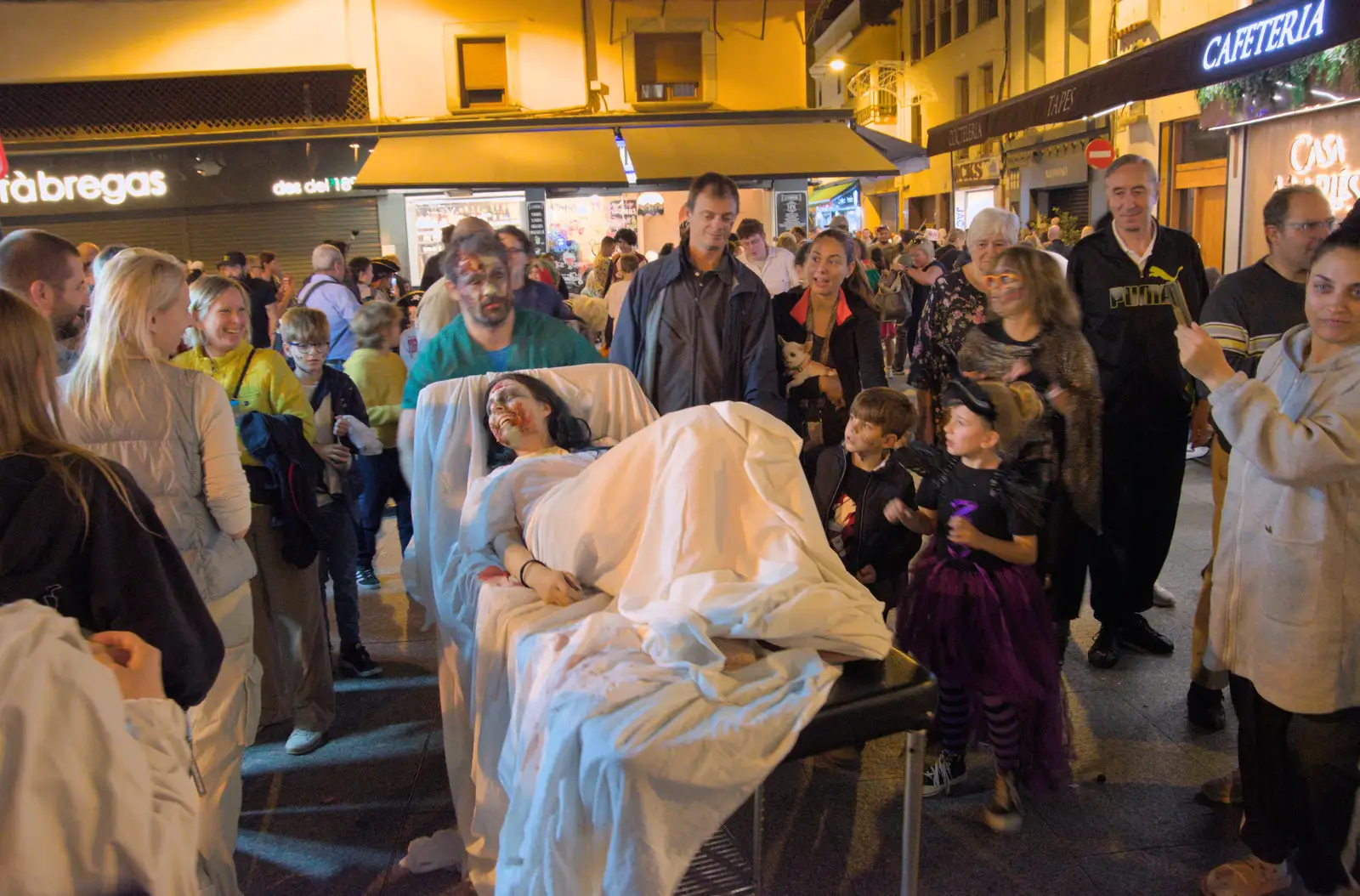 A zombie on a hospital bed rushes past, from Halloween and Flamenco Guitar, Lloret de Mar, Catalunya, Spain - 31st October 2024