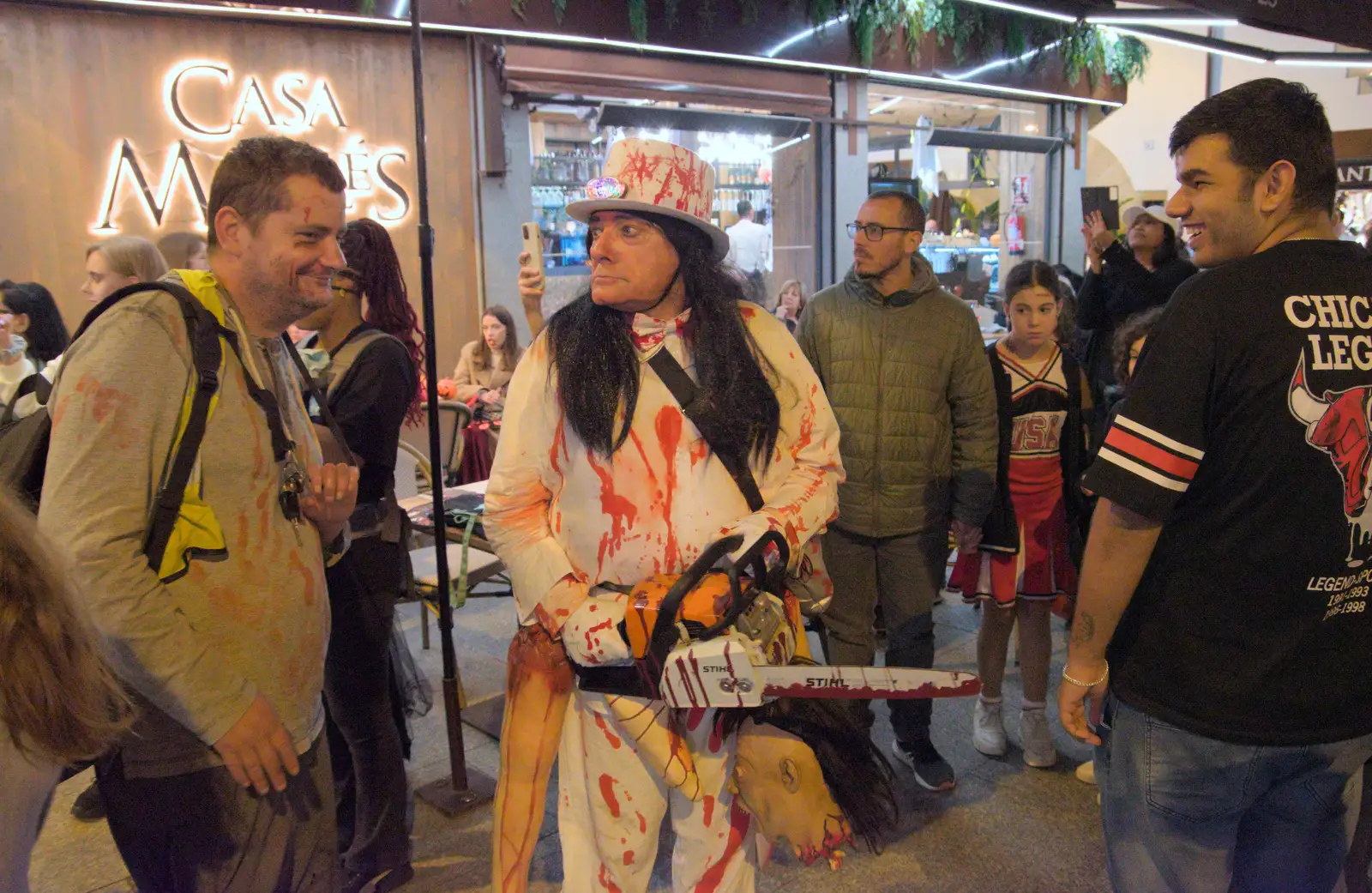 A dude with a blood-splattered chain saw, from Halloween and Flamenco Guitar, Lloret de Mar, Catalunya, Spain - 31st October 2024