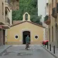 A dude cycles up to an old church, Blanes, and the Castanyada Festival, Lloret de Mar, Catalunya - 1st November 2024