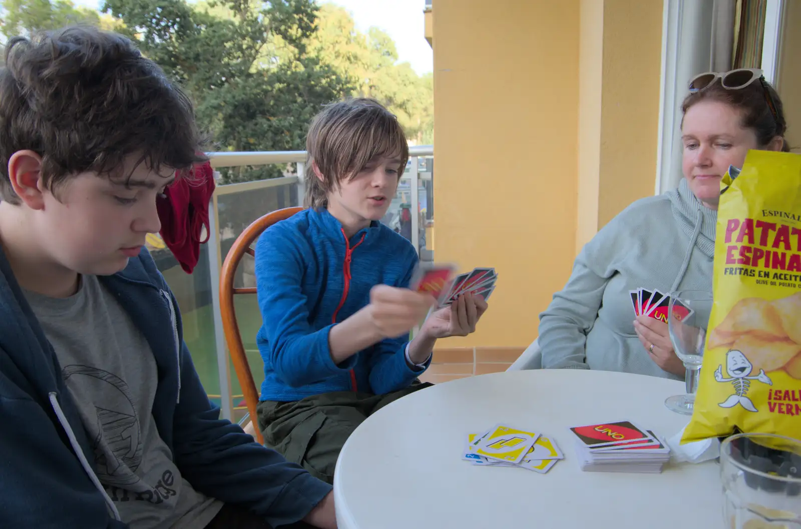 We play an endless game of Uno on the balcony, from Blanes, and the Castanyada Festival, Lloret de Mar, Catalunya - 1st November 2024