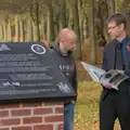 Steve flicks through a book, Remembrance Sunday with the GSB, Brome and Botesdale, Suffolk - 10th November 2024