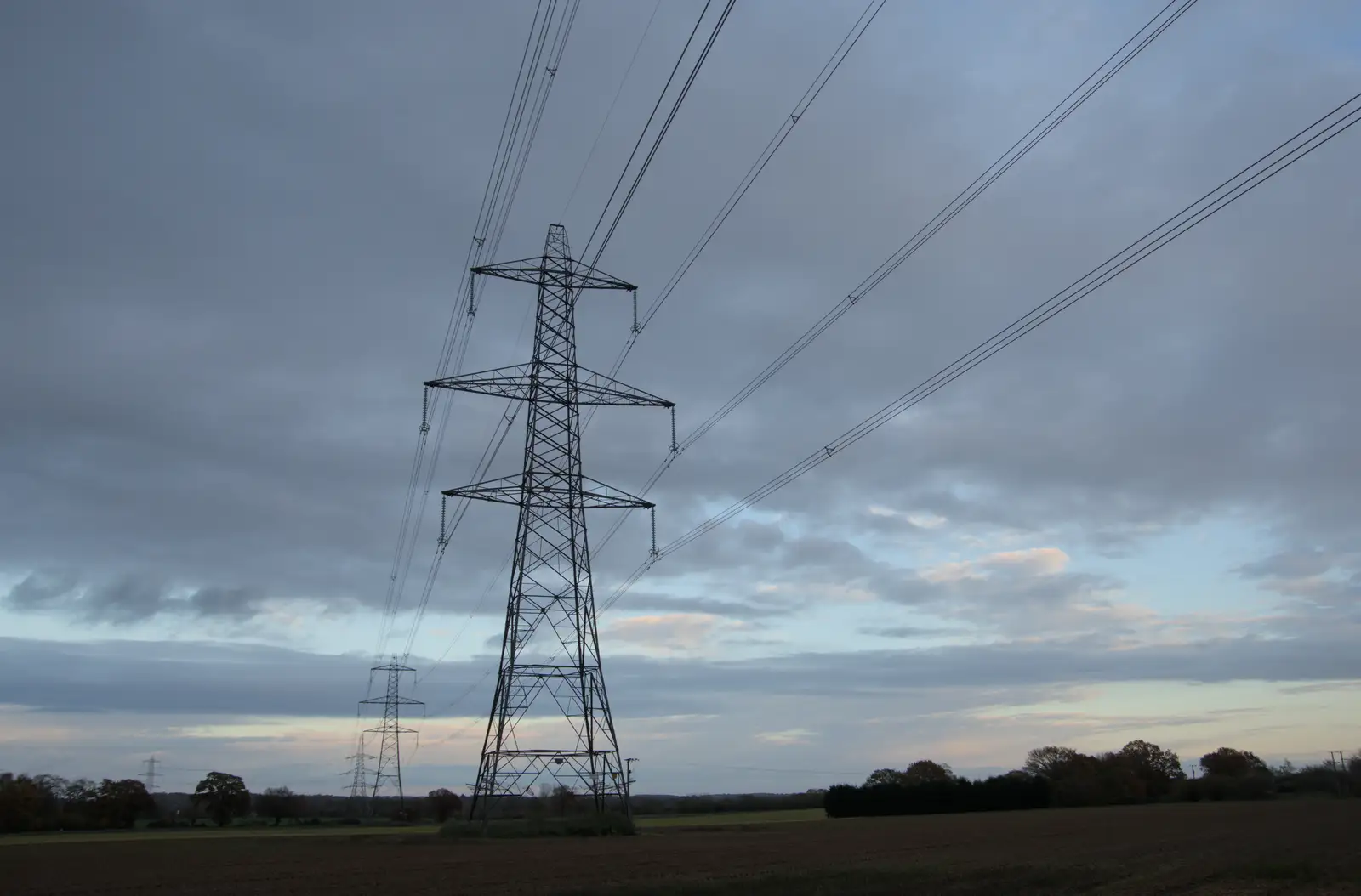 Pylons stride across the land near Brome, from A Pub Walk to Ampersand, Diss, Norfolk - 17th November 2024