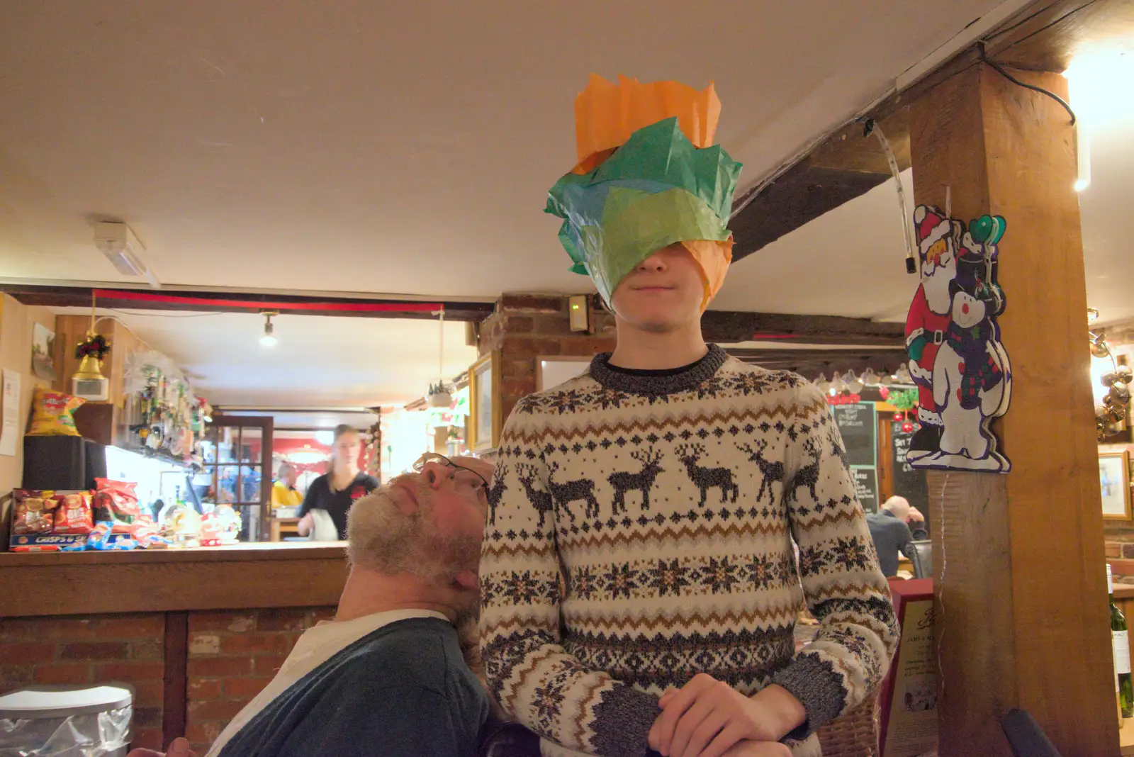 Marc looks up at Harry's hats, from The Lads on Tour and the BSCC at the Red Lion, Needham - 30th November 2024