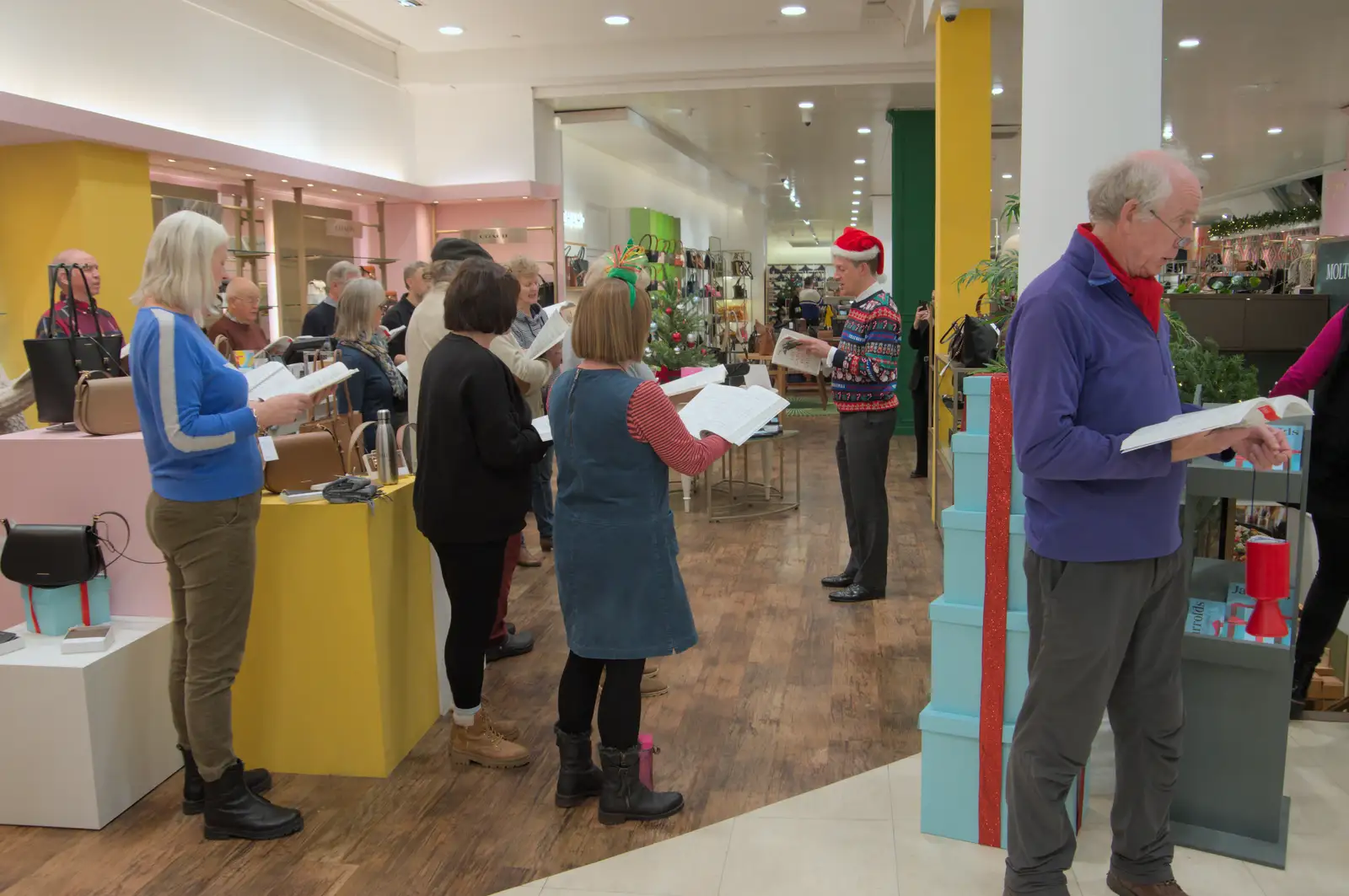 There's a choir singing in Jarrold's, from Christmas Shopping in Norwich, Norfolk - 8th December