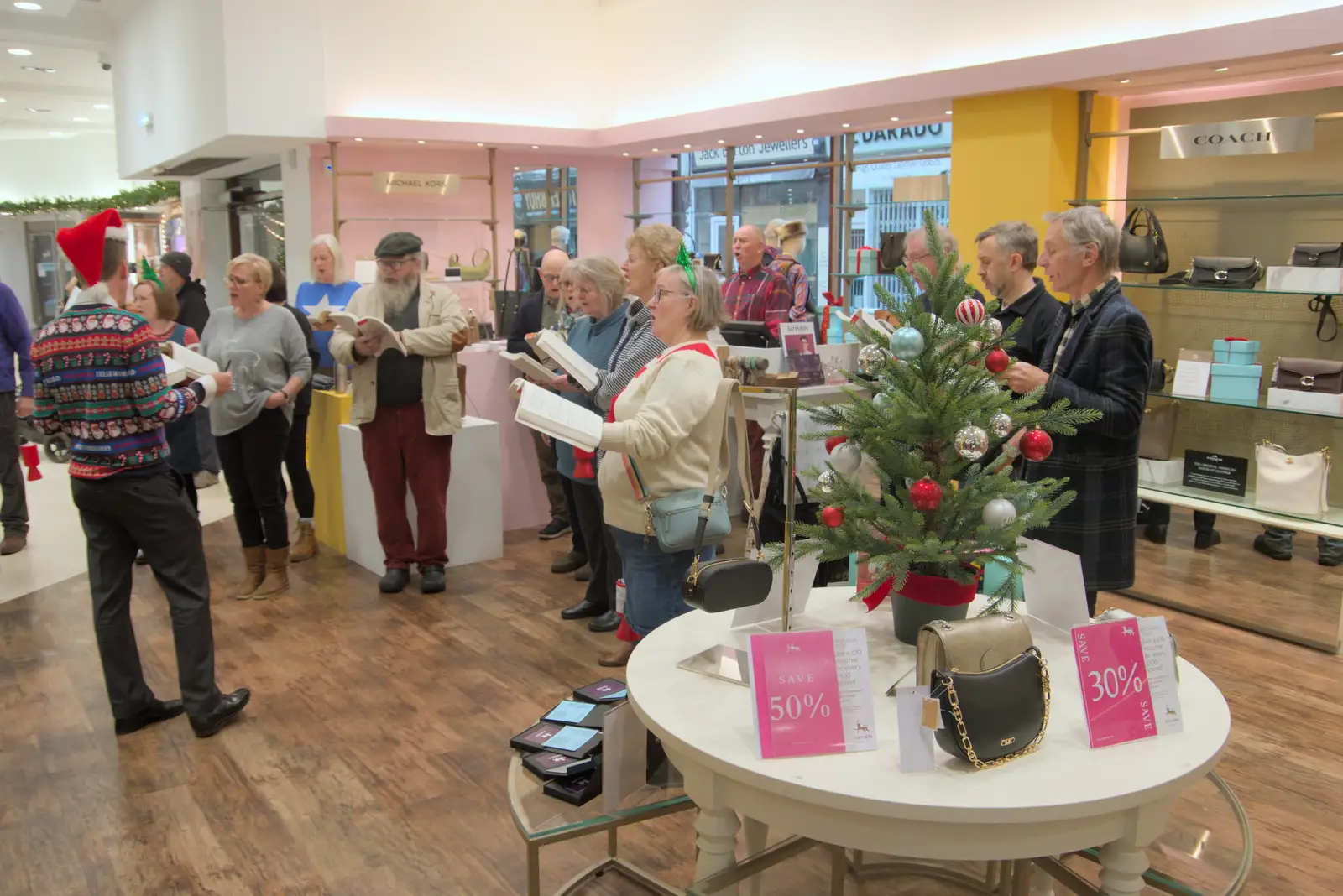 The Norwich Philharmonic Chorus in Jarrold's, from Christmas Shopping in Norwich, Norfolk - 8th December