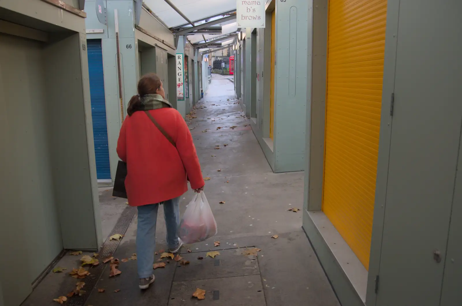 Isobel roams around with a bag of spicy noodles, from Christmas Shopping in Norwich, Norfolk - 8th December