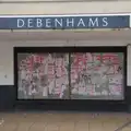 Debenhams, with faded Communist Party posters, Christmas Shopping in Norwich, Norfolk - 8th December