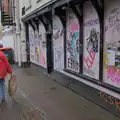 Isobel wanders past a heavily-graffiti'd building, Christmas Shopping in Norwich, Norfolk - 8th December