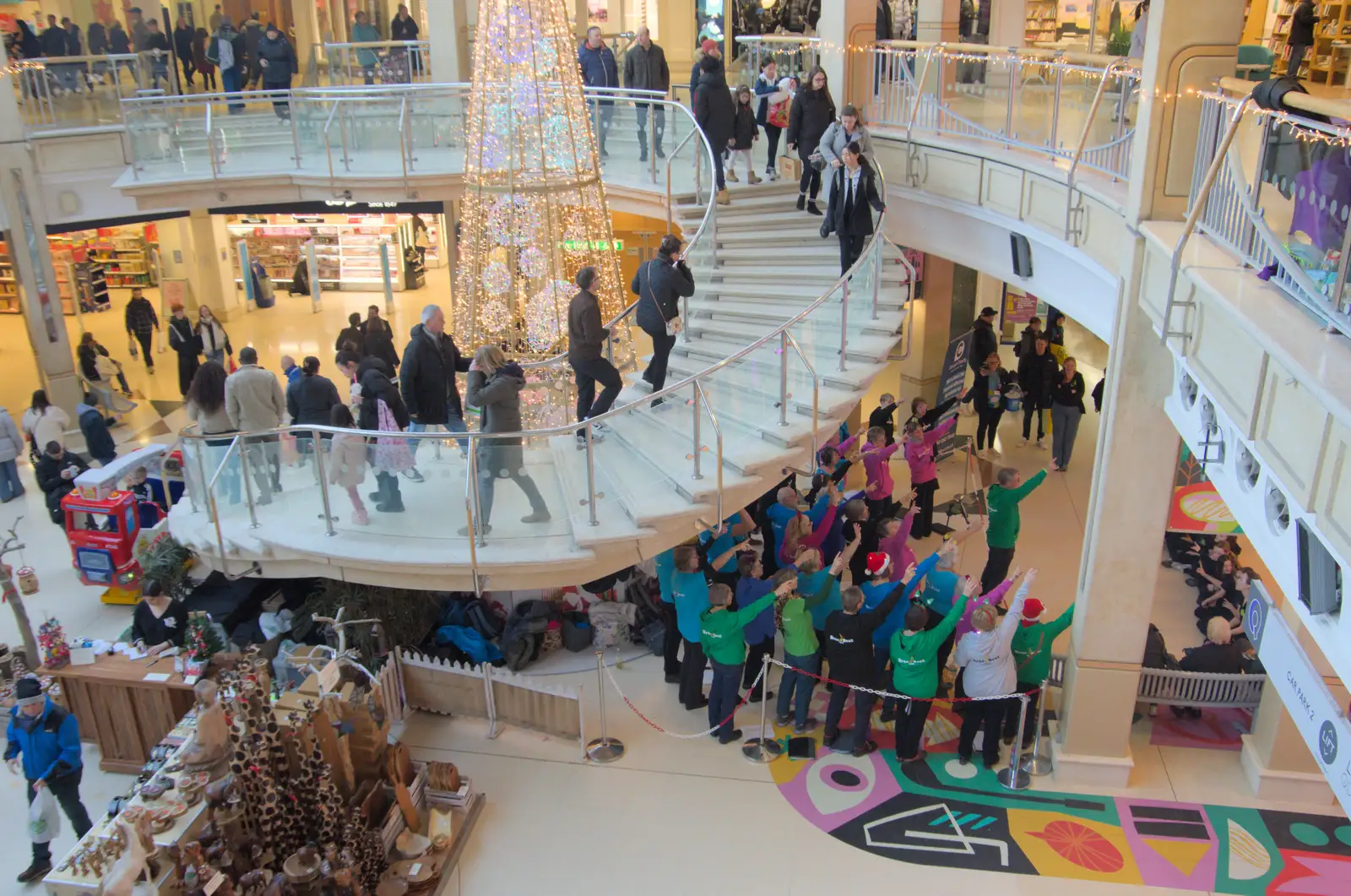 The choir points to a partridge in a pear tree, from Another Christmas Shopping Day, Norwich, Norfolk - 14th December 2024