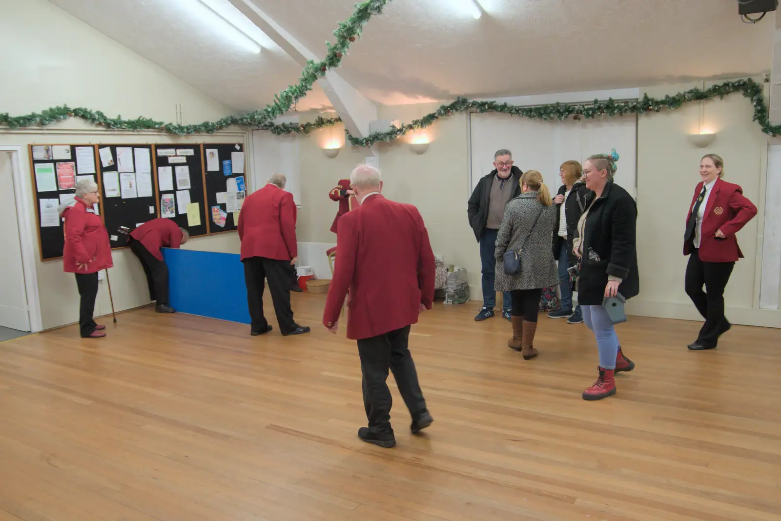 The band has the task of tidying up the room, from A Weekend of Music with the GSB, Gislingham and Thornham - 15th December 2024